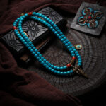 Handmade Tibetan Turquoise & Red Coral Mala Necklace - 108 Beads with Brass Vajra & Skull Charm - Vintage Ethnic Spiritual Jewelry - Yoga Meditation Prayer Beads for Men Women